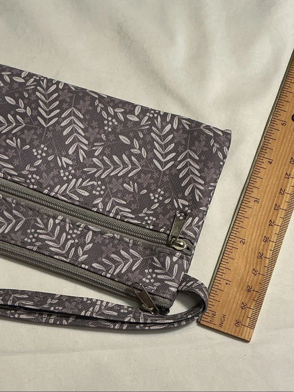 Cosmetics 5 pieces Brown Eyeliner & 3 shades of lip gloss w/ floral wristlet